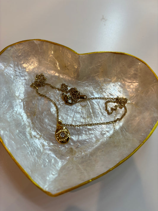 Gold eye necklace